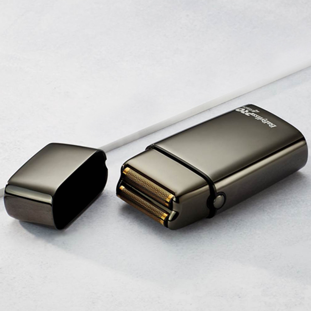 Професионална самобръсначка с двойна глава Babyliss PRO FoilFX02 GUNsteelFX Shaver FXFS2GSE
